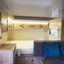 Offroad-Caravan X-Indoor / Produkt: Offroad-Wohnkabine auf Einachser-Fahrgestell / Schlafhubdach und Fahrradträger